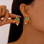 Boucles d’Oreilles Fleur de Lys Dorées
